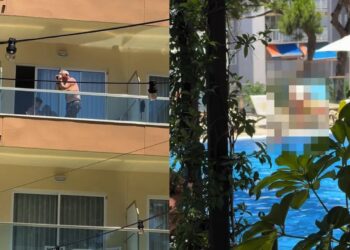 Video: Opa geniet van fijn van uitzicht op hotelkamer in Salou